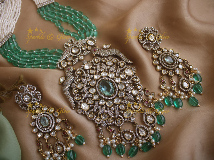 Grand floral pendent Victorian AD haram with multi layer green beads and pearl chain