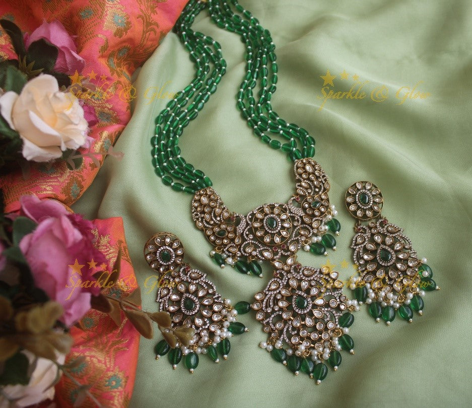 Exquisite grand Peacock pendent Victorian AD haram with multi layer red beads chain - red