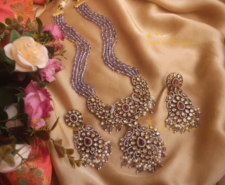 Exquisite grand Peacock pendent Victorian AD haram with multi layer red beads chain - red
