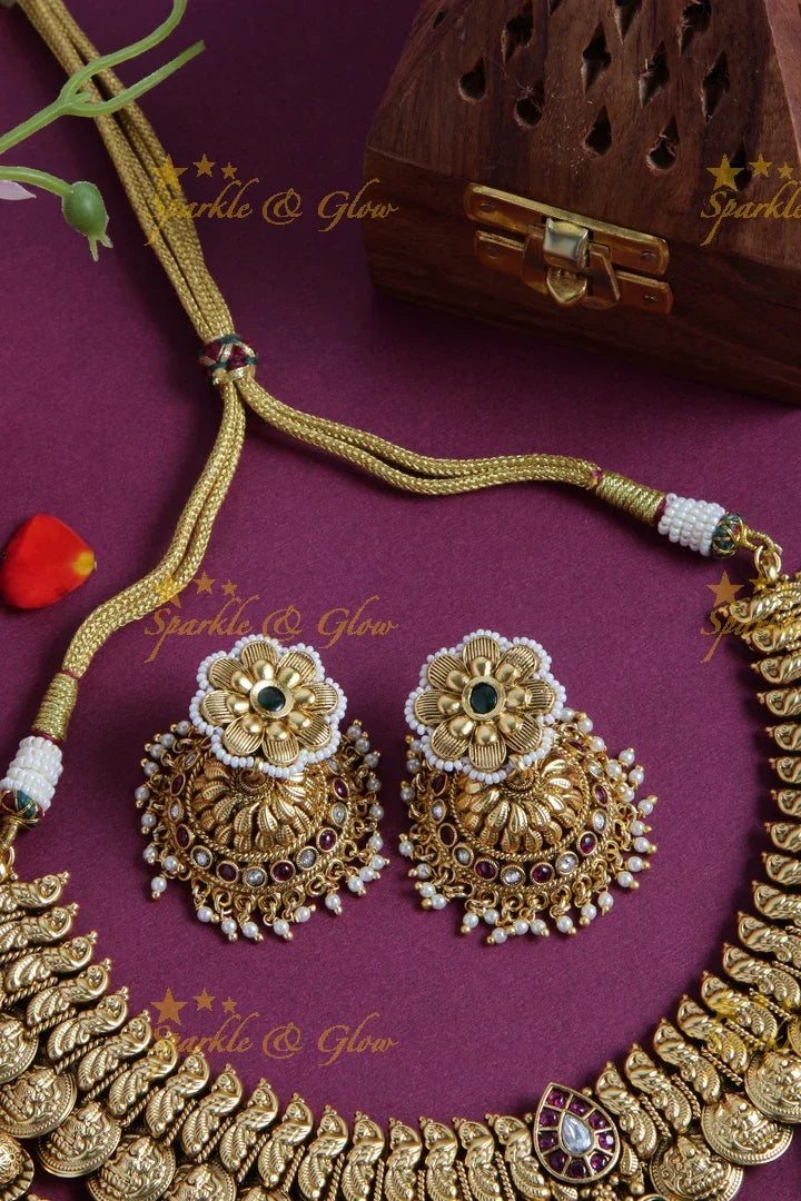 Gold alike Lakshmi coin and peacock short necklace with layered mint green beads - Sparkle and Glow