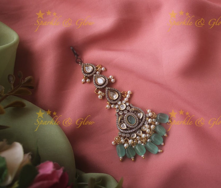 Stunning victorian maang tikka with green stone and green beads