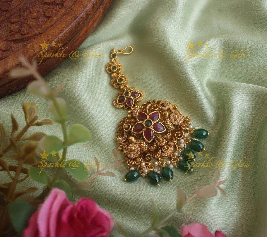 Gold alike floral peacock maang tikka with cz stones ruby emerald and green beads - Sparkle and Glow