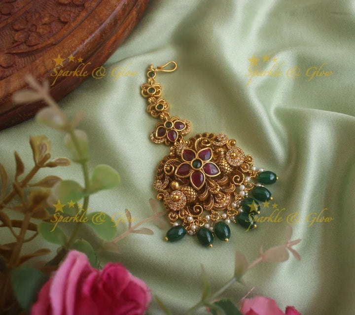 Gold alike floral peacock maang tikka with cz stones ruby emerald and green beads - Sparkle and Glow