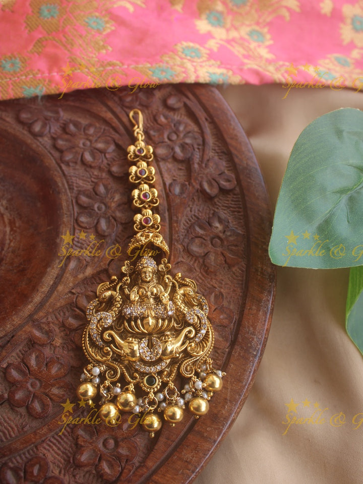 Gold alike Lakshmi peacock elephant maang tikka with cz stones and gold beads