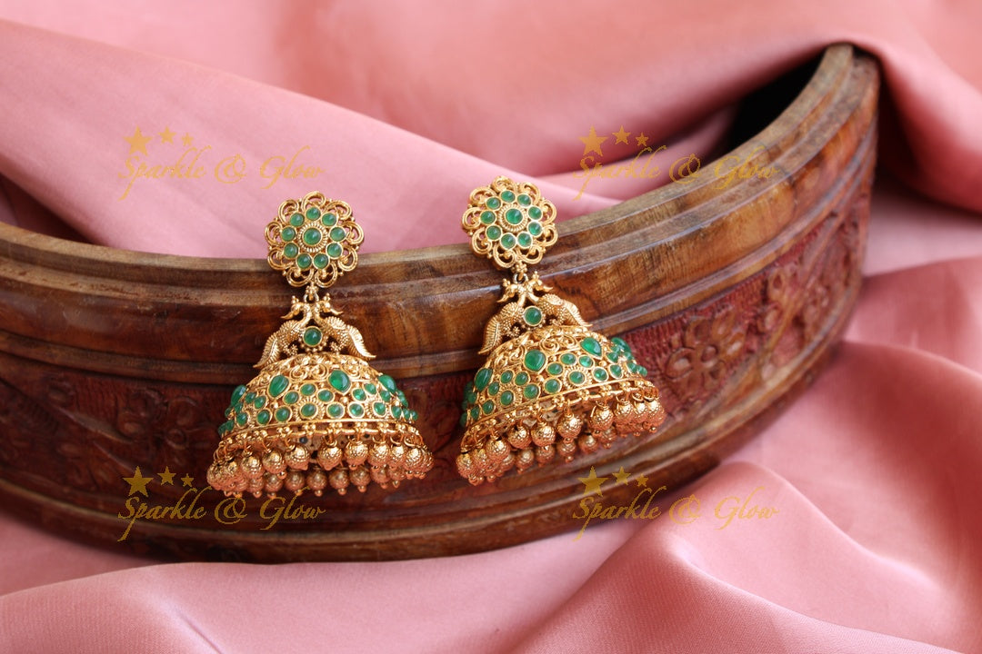 Elegant peacock gold alike jhumukas with green stones