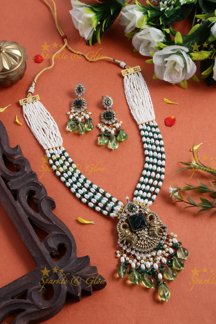 Exquisite elephant pendent Victorian AD haram with multi layer pearl and red beads chain