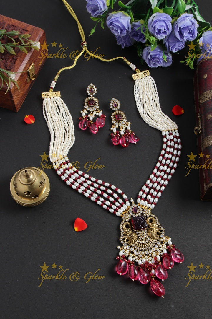 Exquisite elephant pendent Victorian AD haram with multi layer pearl and red beads chain