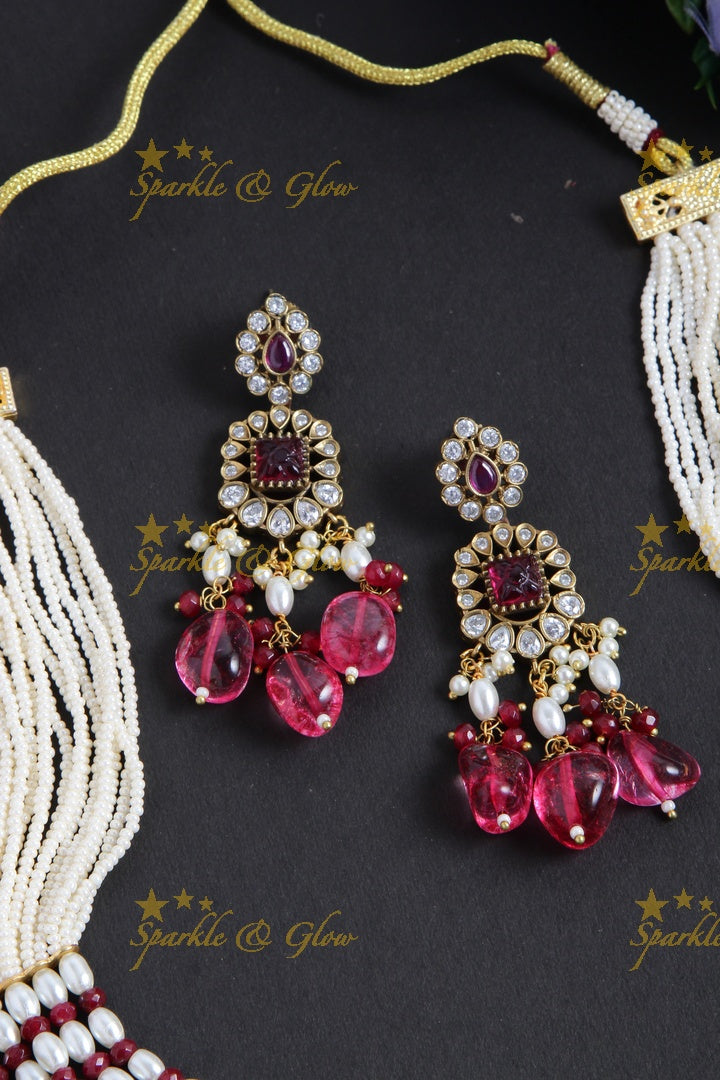 Exquisite elephant pendent Victorian AD haram with multi layer pearl and red beads chain