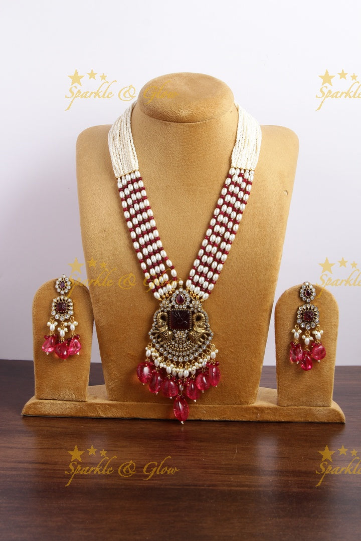 Exquisite elephant pendent Victorian AD haram with multi layer pearl and red beads chain