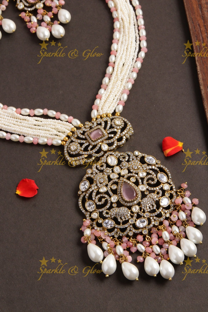 Elegant Peacock elephant pendent Victorian AD haram with multi layer pearl chain and peach white beads