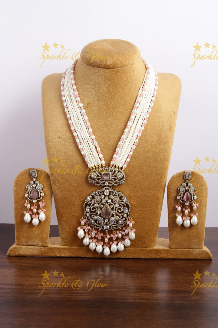 Elegant Peacock elephant pendent Victorian AD haram with multi layer pearl chain and peach white beads