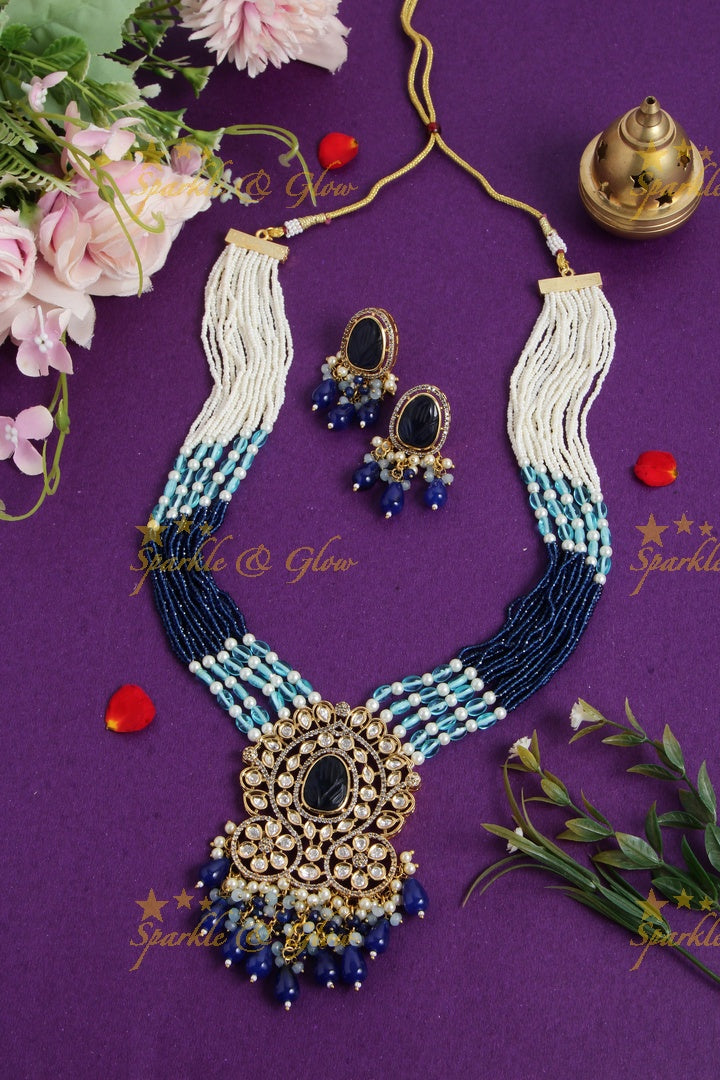 Elegant floral design pendent Victorian AD haram with multi layer pearl and blue beads chain