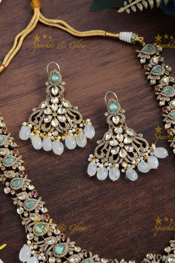 Gorgeous peacock and floral design Victorian AD long necklace with sea blue stones and beads
