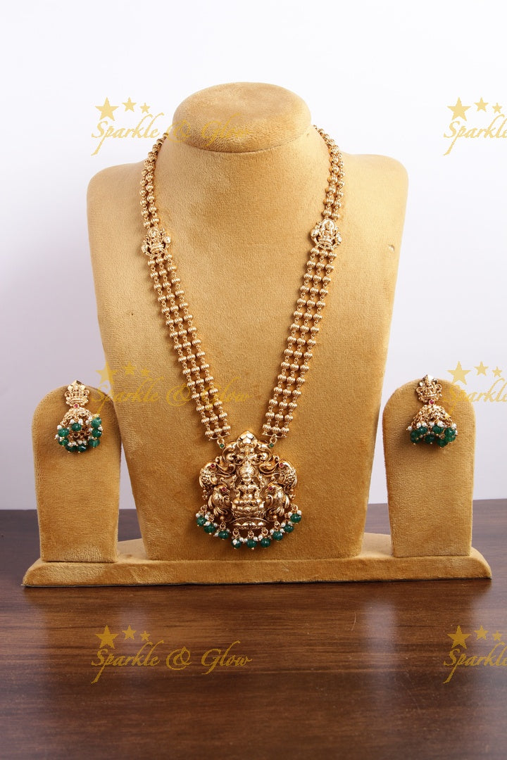 Gold Alike Lakshmi peacock carved pendent multi layer gold beads haram with green beads