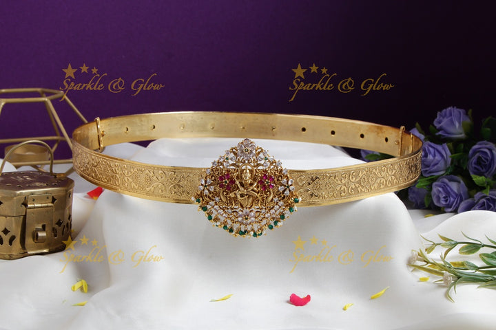 Exquisite Narasimha carved gold alike hipbelt with multi colour stones green beads