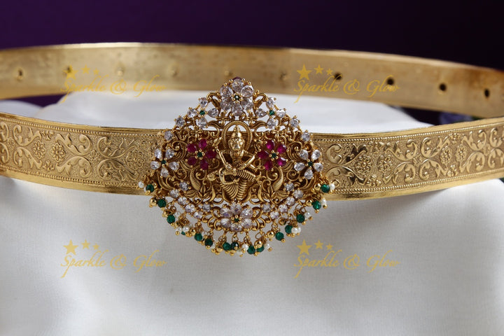 Exquisite Narasimha carved gold alike hipbelt with multi colour stones green beads