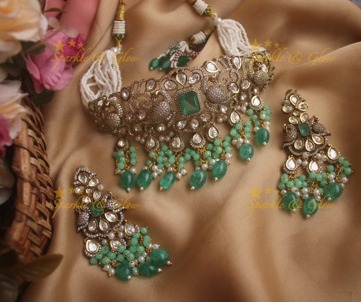 Beautiful peacock carved Victorian AD choker with multi layer pearls and green beads