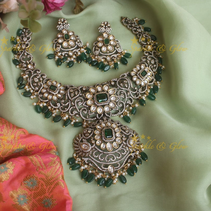Statement floral leaf design Victorian AD necklace with red stones and green beads