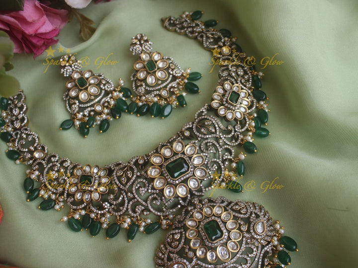 Statement floral leaf design Victorian AD necklace with green stones and green beads