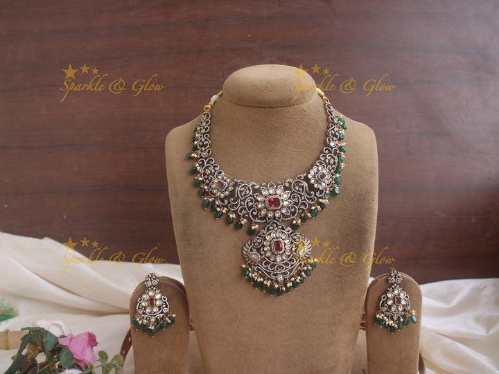 Statement floral leaf design Victorian AD necklace with red stones and green beads