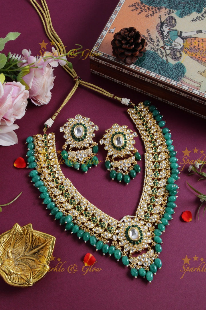 Grand intricate floral design kundan short necklace with pearls green beads