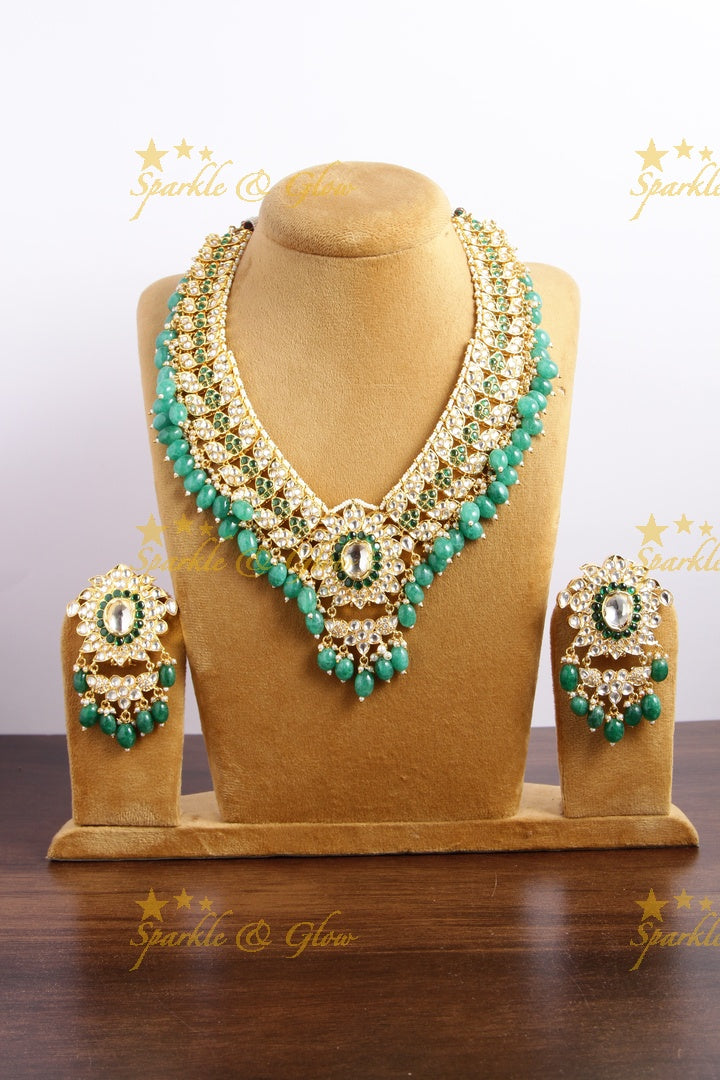 Grand intricate floral design kundan short necklace with pearls green beads