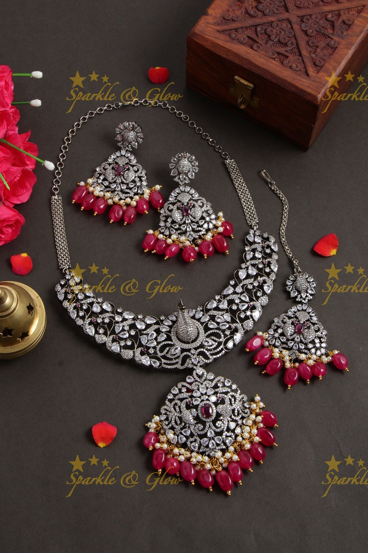 Exquisite peacock carved black finish Victorian AD long necklace with pearls and red beads - with mang tikka