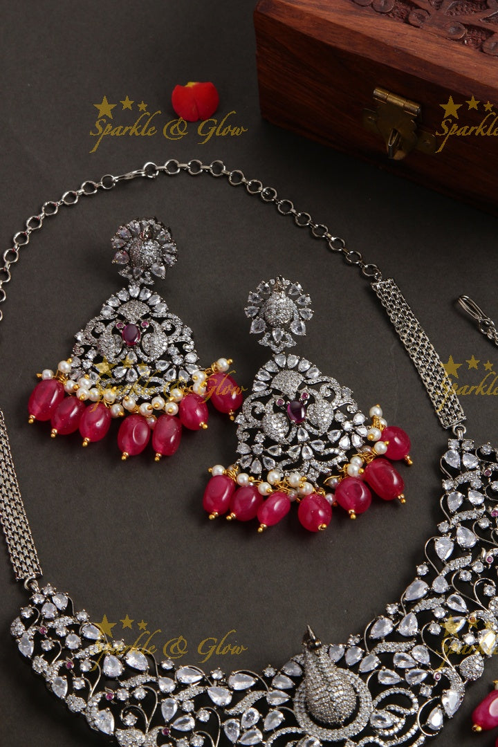 Exquisite peacock carved black finish Victorian AD long necklace with pearls and red beads - with mang tikka