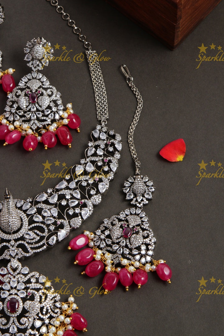 Exquisite peacock carved black finish Victorian AD long necklace with pearls and red beads - with mang tikka