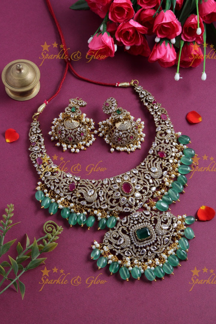 Exclusive peacock and floral design Victorian AD short necklace with multi colour stones and red beads