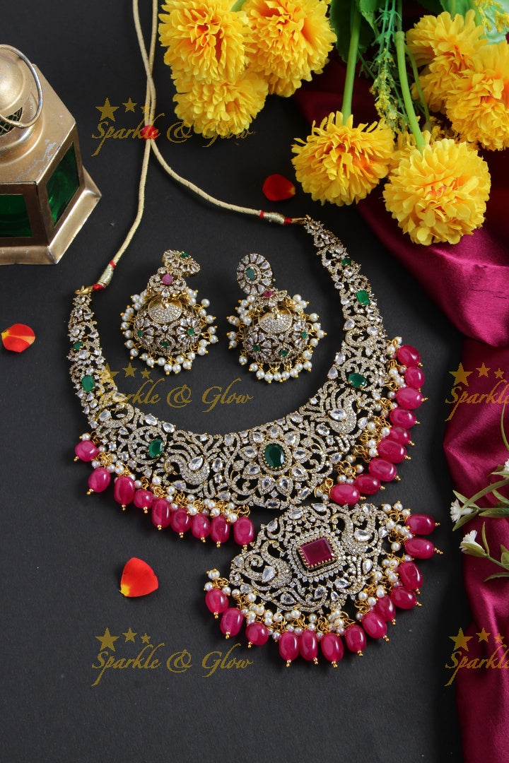 Exclusive peacock and floral design Victorian AD short necklace with multi colour stones and red beads