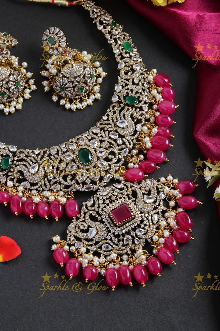 Exclusive peacock and floral design Victorian AD short necklace with multi colour stones and red beads