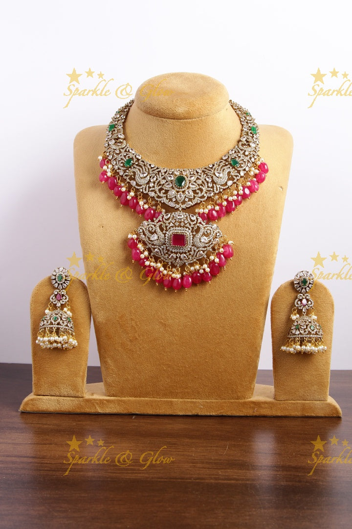 Exclusive peacock and floral design Victorian AD short necklace with multi colour stones and red beads