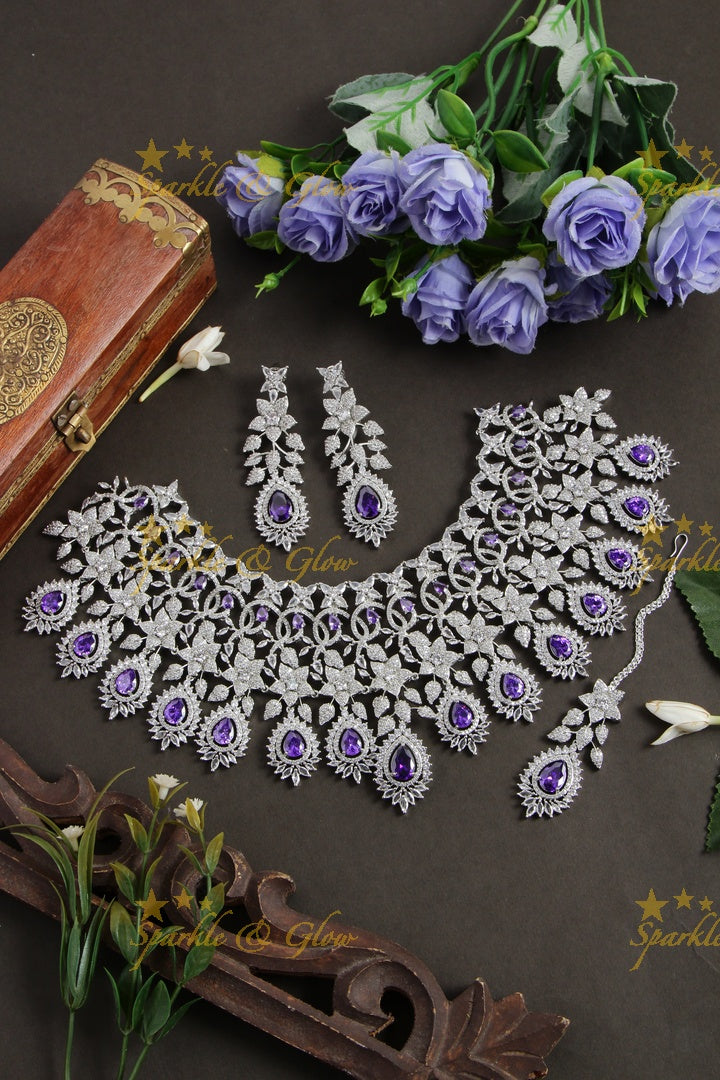 Glittering floral design American diamond bridal choker with mang tikka - purple stones