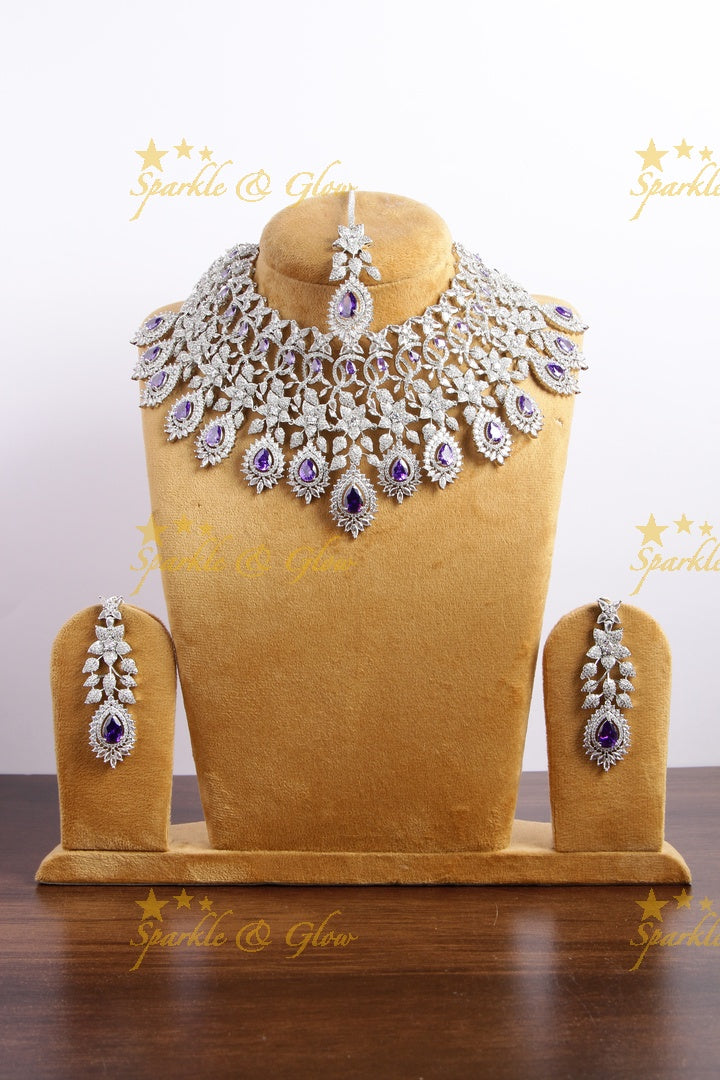 Glittering floral design American diamond bridal choker with mang tikka - purple stones
