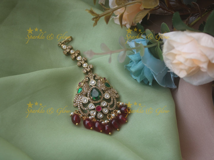 Beautiful peacock design victorian maang tikka with red stone and mint green beads