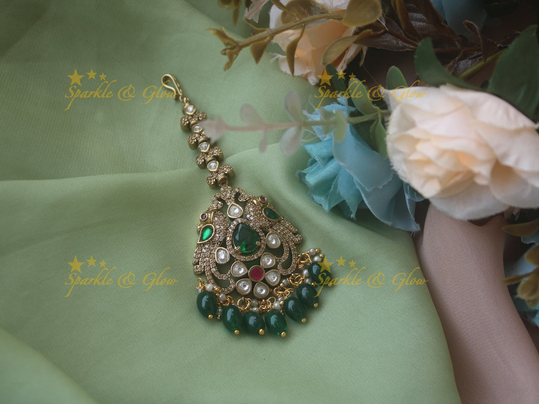 Beautiful peacock design victorian maang tikka with red stone and mint green beads