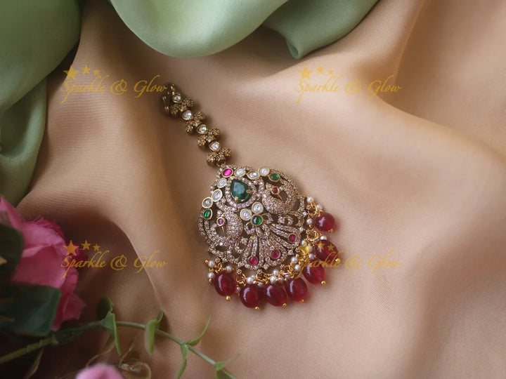 Red Stone Peacock Maang Tikka with Purple Beads