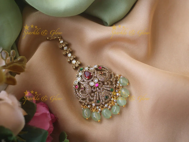 Red Stone Peacock Maang Tikka with Purple Beads