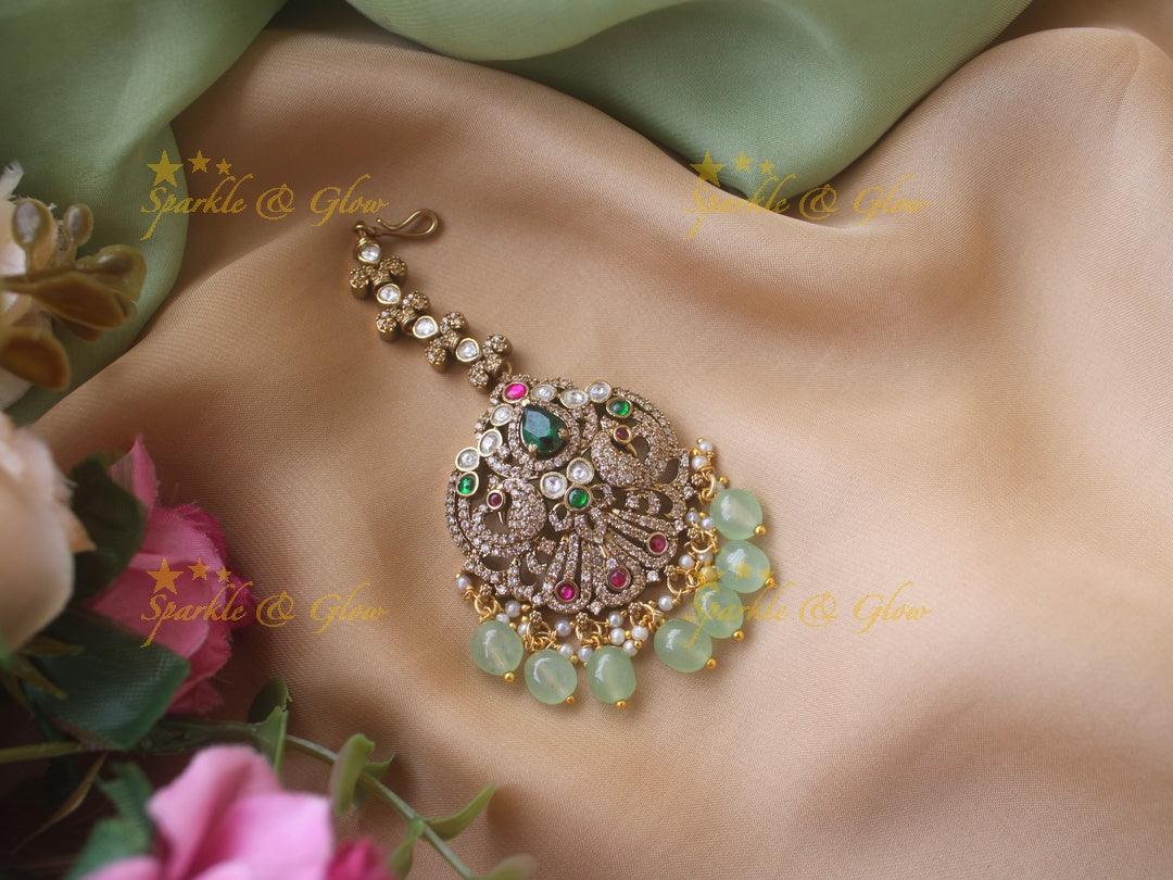 Red Stone Peacock Maang Tikka with Purple Beads