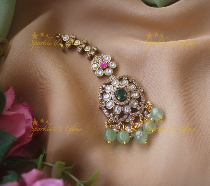 Floral design victorian maang tikka with multi colour stones and purple beads