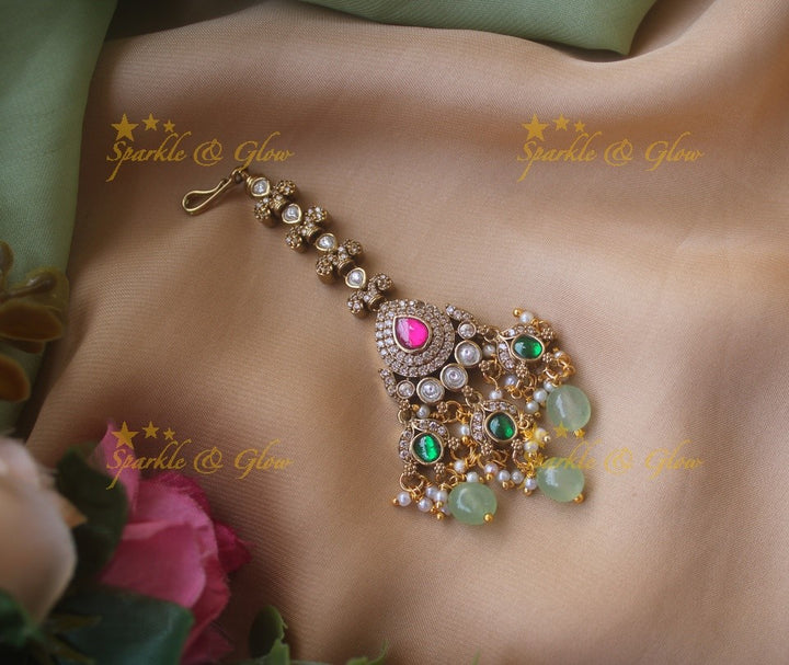 Elegant Floral victorian maang tikka with Maroon beads and Green and maroon stone