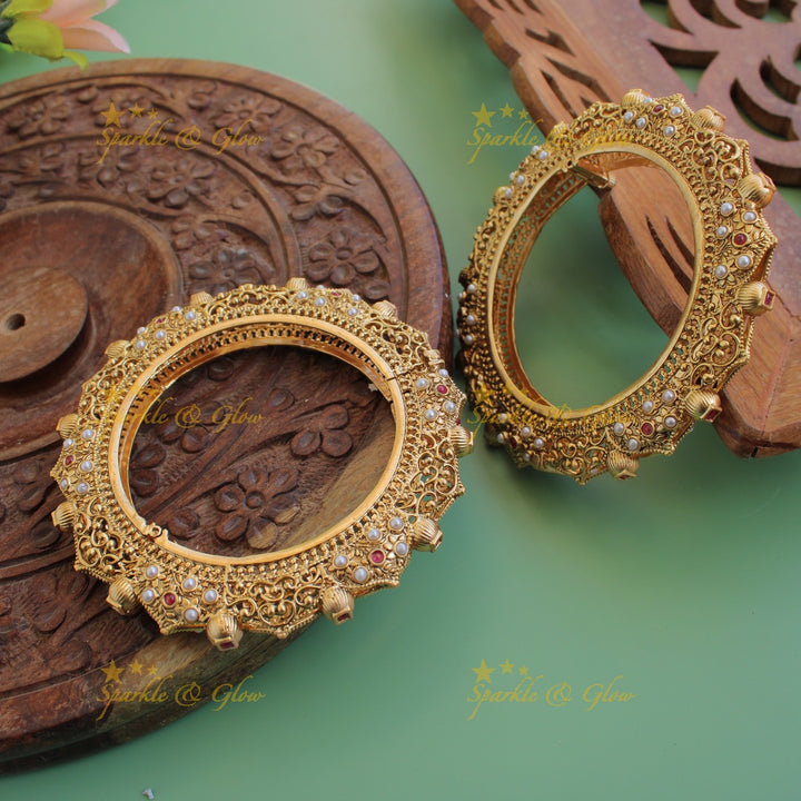 Grand intricate flower and leaf design kadas with ruby and pearls a pair,
