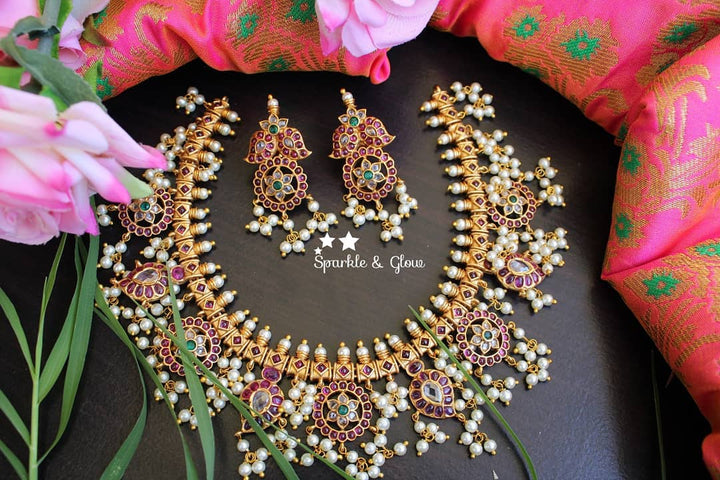 Gorgeous flower mango design kemp gutta pusalu
