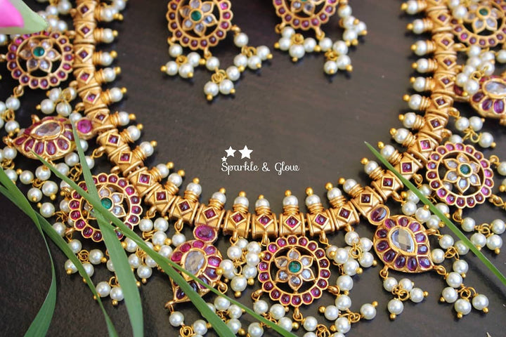 Gorgeous flower mango design kemp gutta pusalu