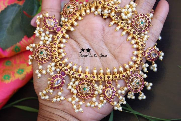 Gorgeous flower mango design kemp gutta pusalu