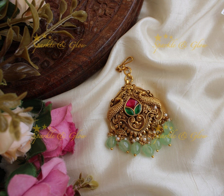 Peacock design jadau maang tikka with mint green beads