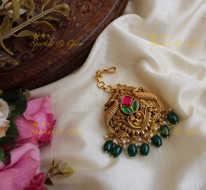 Peacock design jadau maang tikka with mint green beads