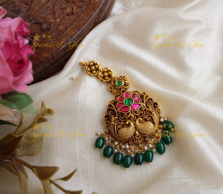 Floral and peacock design jadau maang tikka with mint green beads
