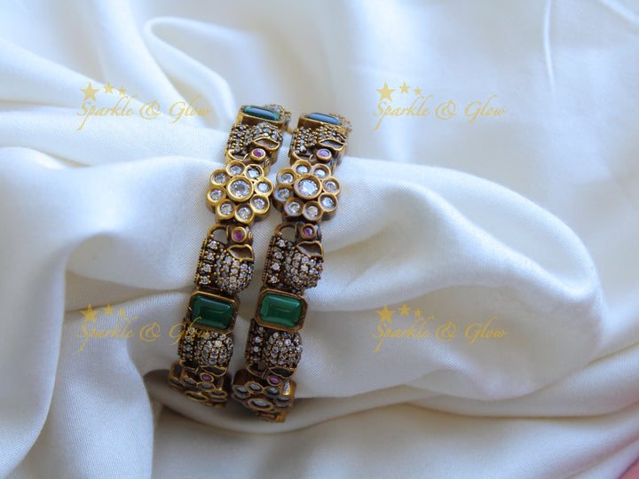 Statement Elephant design victorian bangles with ruby and emerald a pair,